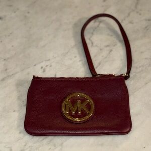 Michael Kors Maroon Wristlet with Gold Logo